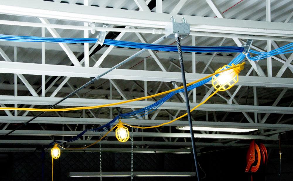 50 ft. 14/2 SJTW 5-Cage Temporary Work Light Stringer 15A Male/Female Ends Yellow GL50142MPC